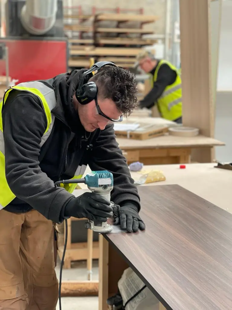 Joiner routing an edge in the workshop